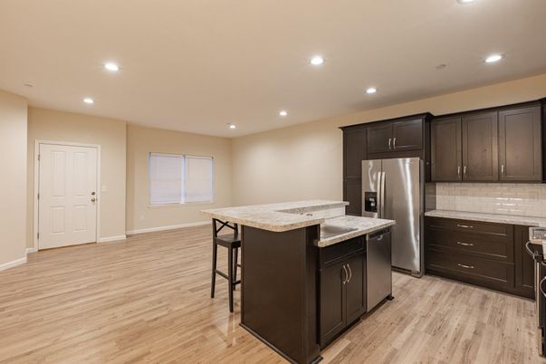 Interior, Kitchen, Recessed Lighting, Stainless Steel Appliances, Wood Texture Flooring