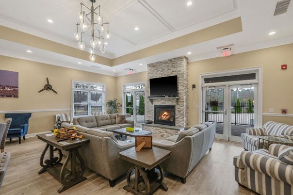 Fireplace, Interior, Living room, Pendant Lights, Recessed Lighting, Stone Walls, Wood Texture Flooring