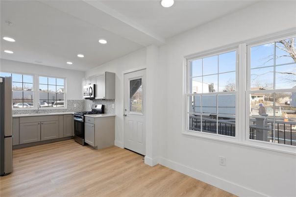Interior, Kitchen, Recessed Lighting, Stainless Steel Appliances, Wood Texture Flooring
