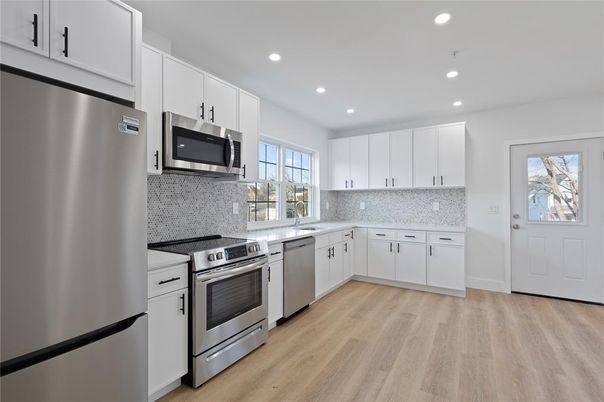 Interior, Kitchen, Recessed Lighting, Stainless Steel Appliances, Wood Texture Flooring