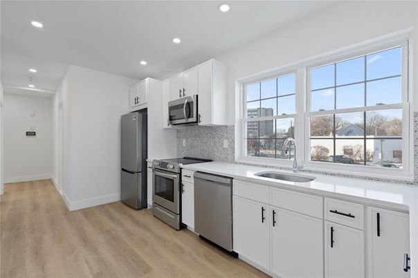 Interior, Kitchen, Recessed Lighting, Stainless Steel Appliances, Wood Texture Flooring