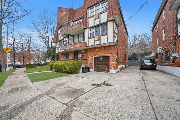 Attached, Exterior, Facade, Brick Facade, Tudor Revival