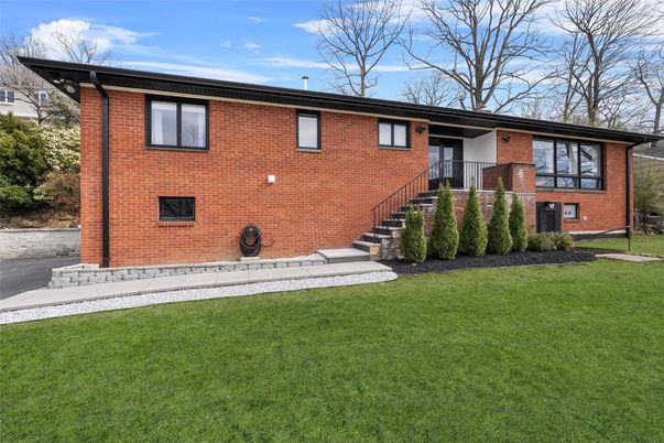 Exterior, Facade, Brick Facade, Raised Ranch