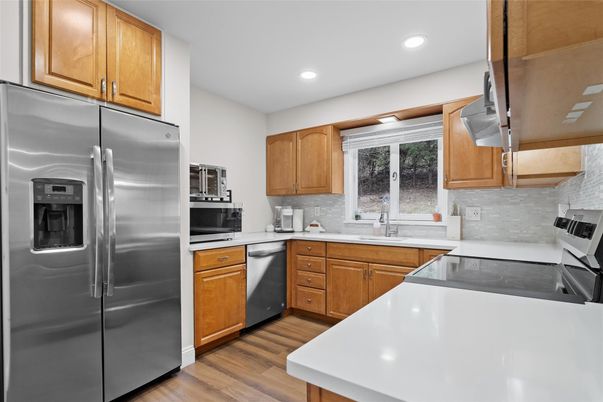 Interior, Kitchen, Recessed Lighting, Stainless Steel Appliances, Wood Texture Flooring