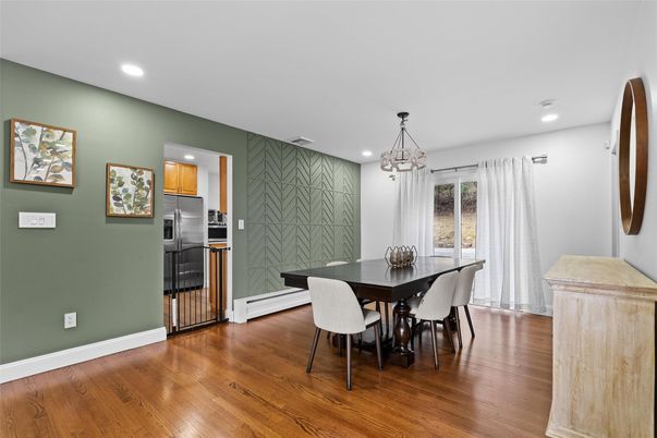 Chandelier, Dining room, Interior, Kitchen, Pendant Lights, Recessed Lighting, Stainless Steel Appliances, Wood Texture Flooring