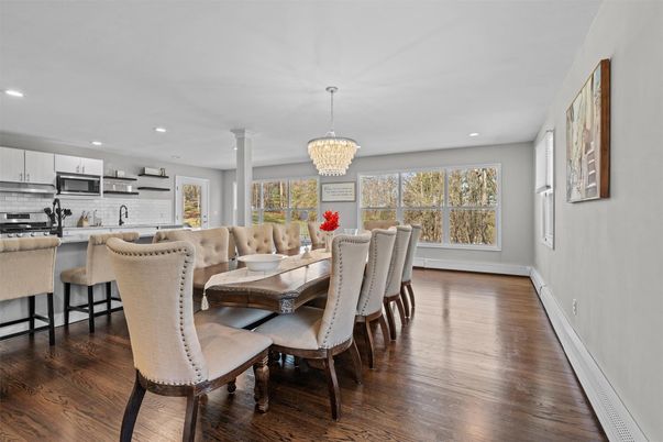 Chandelier, Dining room, Interior, Kitchen, Recessed Lighting, Stainless Steel Appliances, Wood Texture Flooring