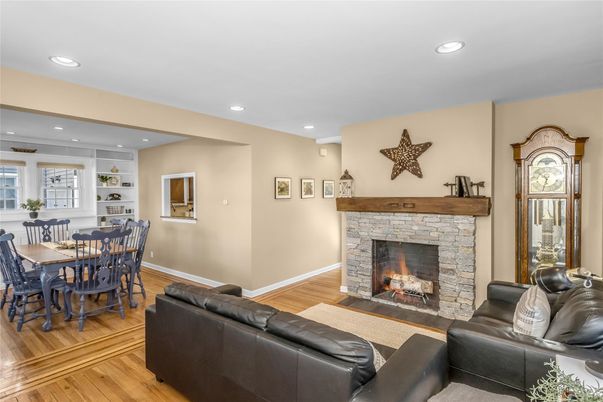 Dining room, Fireplace, Interior, Living room, Recessed Lighting, Wood Texture Flooring