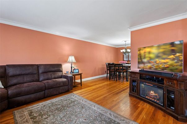 Chandelier, Dining room, Fireplace, Interior, Living room, Wood Texture Flooring