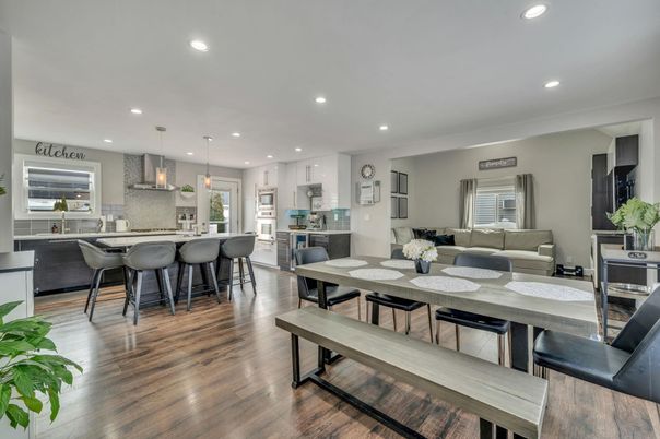 Dining room, Interior, Kitchen, Living room, Pendant Lights, Recessed Lighting, Stainless Steel Appliances, Wood Texture Flooring