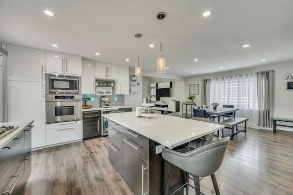 Dining room, Interior, Kitchen, Pendant Lights, Recessed Lighting, Stainless Steel Appliances, Wood Texture Flooring