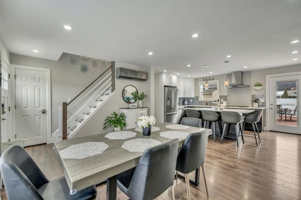 Dining room, Interior, Kitchen, Pendant Lights, Recessed Lighting, Stainless Steel Appliances, Wood Texture Flooring