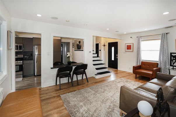 Dining room, Interior, Kitchen, Living room, Recessed Lighting, Stainless Steel Appliances, Wood Texture Flooring