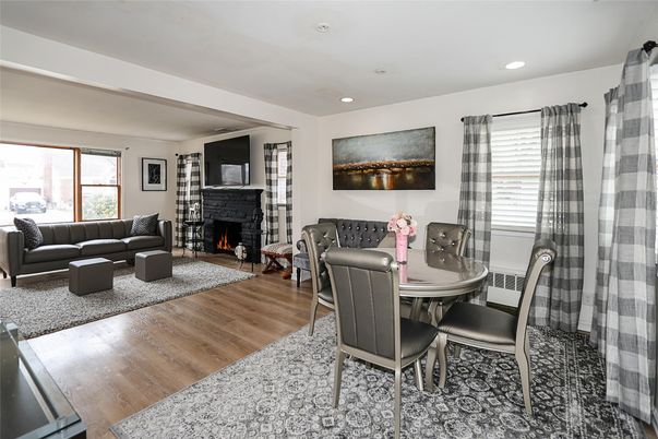 Dining room, Fireplace, Interior, Living room, Recessed Lighting, Wood Texture Flooring
