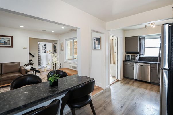 Dining room, Interior, Kitchen, Recessed Lighting, Stainless Steel Appliances, Wood Texture Flooring