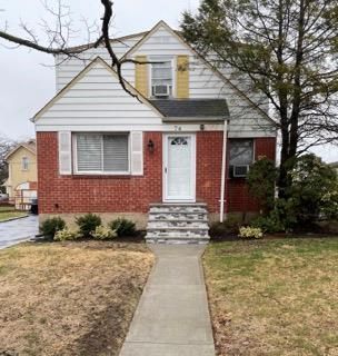 Exterior, Facade, Brick Facade, Cape Cod