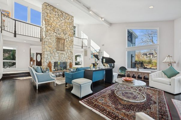 Fireplace, Interior, Living room, Piano, Recessed Lighting, Stone Walls, Wood Texture Flooring