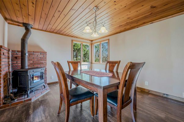 Dining room, Fireplace, Interior, Pendant Lights, Wooden Ceilings, Wood Texture Flooring