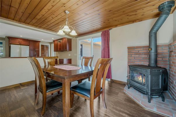 Dining room, Fireplace, Interior, Kitchen, Pendant Lights, Stone Walls, Wooden Ceilings, Wood Texture Flooring