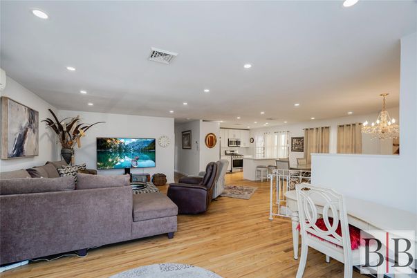 Chandelier, Dining room, Interior, Kitchen, Living room, Recessed Lighting, Stainless Steel Appliances, Wood Texture Flooring