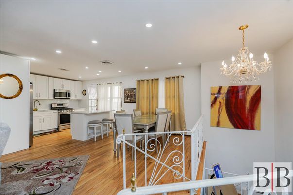 Chandelier, Dining room, Interior, Kitchen, Recessed Lighting, Stainless Steel Appliances, Wood Texture Flooring