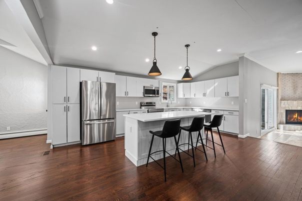 Fireplace, Interior, Kitchen, Pendant Lights, Recessed Lighting, Stainless Steel Appliances, Wood Texture Flooring