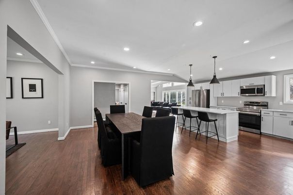 Dining room, Interior, Kitchen, Pendant Lights, Recessed Lighting, Stainless Steel Appliances, Wood Texture Flooring