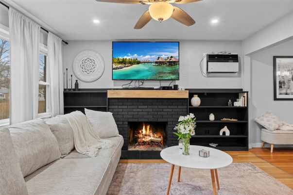 Fireplace, Interior, Living room, Recessed Lighting, Wood Texture Flooring
