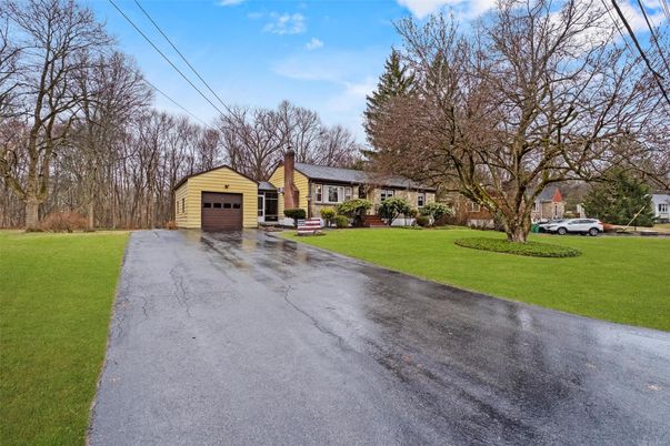 Attached, Backyard, Detached Garage, Exterior, Facade, Brick Facade, None