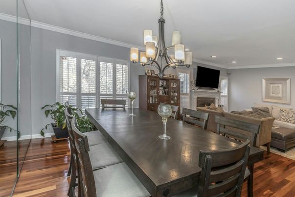 Chandelier, Dining room, Fireplace, Interior, Living room, Recessed Lighting, Wood Texture Flooring