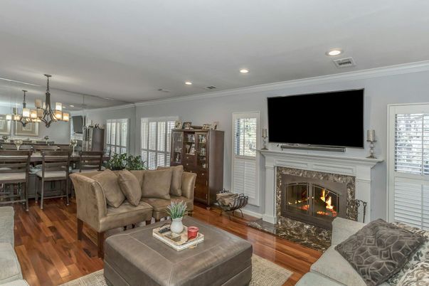 Chandelier, Dining room, Fireplace, Interior, Living room, Recessed Lighting, Wood Texture Flooring