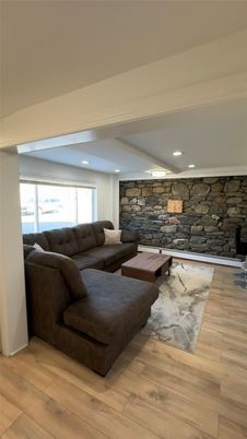 Interior, Living room, Recessed Lighting, Stone Walls, Wood Texture Flooring