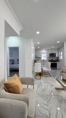 Dining room, Interior, Kitchen, Living room, Marble, Recessed Lighting, Stainless Steel Appliances