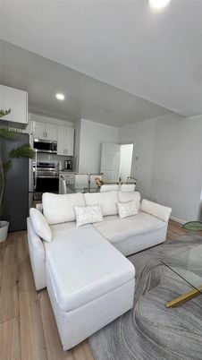 Interior, Kitchen, Living room, Recessed Lighting, Stainless Steel Appliances, Wood Texture Flooring