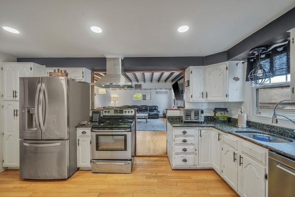 Interior, Kitchen, Recessed Lighting, Stainless Steel Appliances, Wood Texture Flooring