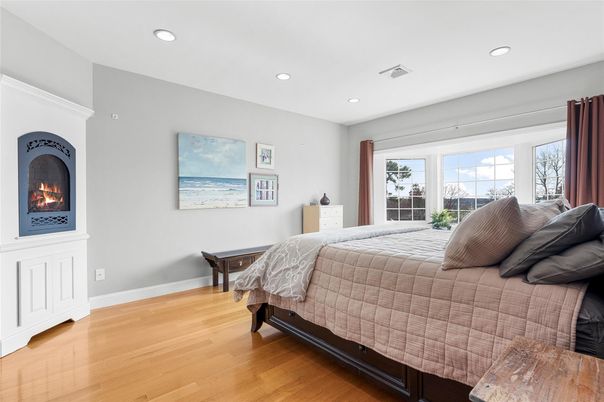 Bedroom, Fireplace, Interior, Recessed Lighting, Wood Texture Flooring