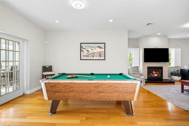Billiard Table, Fireplace, Game Room, Interior, Recessed Lighting, Wood Texture Flooring