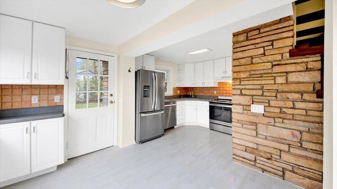 Interior, Kitchen, Recessed Lighting, Stainless Steel Appliances, Stone Walls