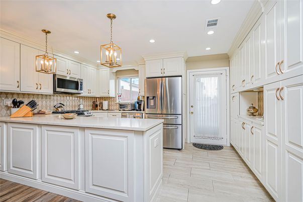 Interior, Kitchen, Pendant Lights, Recessed Lighting, Stainless Steel Appliances, Wood Texture Flooring