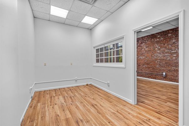 Empty room, Interior, Recessed Lighting, Stone Walls, Wood Texture Flooring
