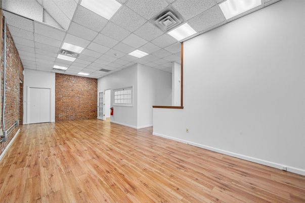 Empty room, Interior, Recessed Lighting, Stone Walls, Wood Texture Flooring
