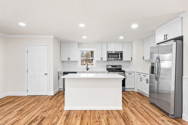 Interior, Kitchen, Recessed Lighting, Stainless Steel Appliances, Wood Texture Flooring