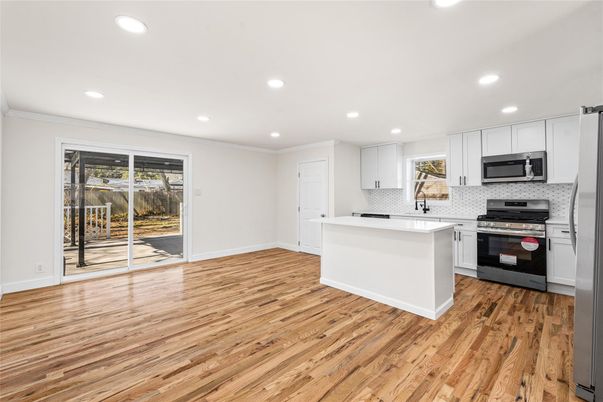 Interior, Kitchen, Recessed Lighting, Stainless Steel Appliances, Wood Texture Flooring