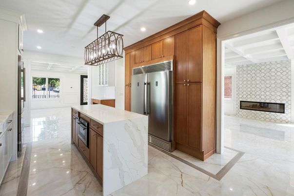 Chandelier, Fireplace, Interior, Kitchen, Marble, Pendant Lights, Recessed Lighting, Stainless Steel Appliances