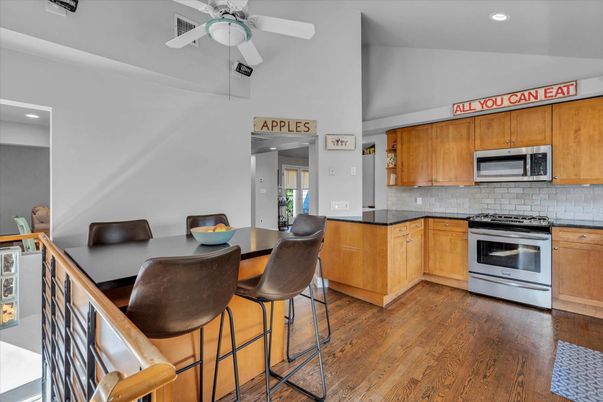 Dining room, Interior, Kitchen, Recessed Lighting, Stainless Steel Appliances, Wood Texture Flooring