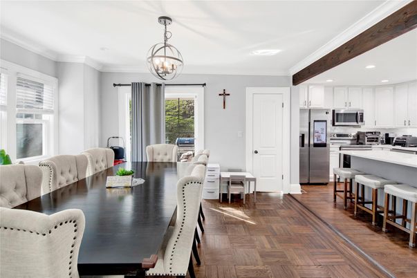 Chandelier, Dining room, Interior, Kitchen, Pendant Lights, Recessed Lighting, Stainless Steel Appliances, Wooden Beams, Wood Texture Flooring