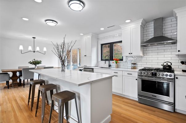 Dining room, Interior, Kitchen, Pendant Lights, Recessed Lighting, Stainless Steel Appliances, Wood Texture Flooring
