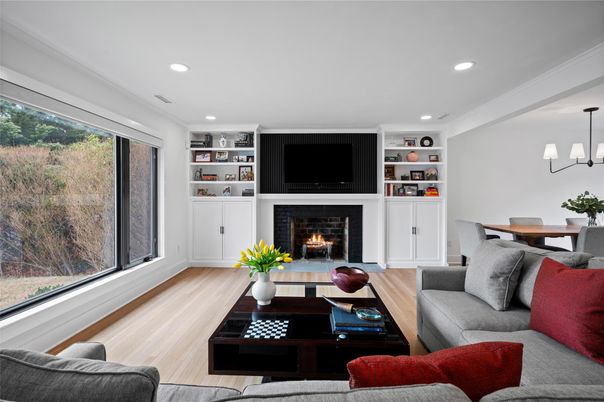 Dining room, Fireplace, Interior, Living room, Recessed Lighting, Wood Texture Flooring