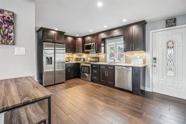 Interior, Kitchen, Recessed Lighting, Stainless Steel Appliances, Wood Texture Flooring