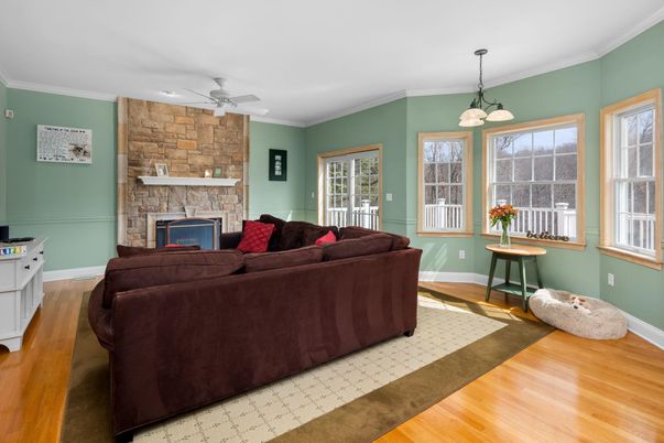 Fireplace, Interior, Living room, Pendant Lights, Stone Walls, Wood Texture Flooring