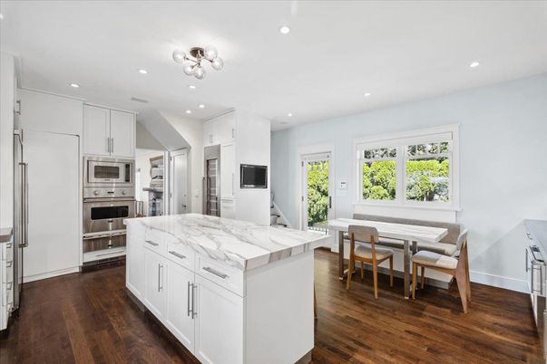 Dining room, Interior, Kitchen, Recessed Lighting, Stainless Steel Appliances, Wood Texture Flooring